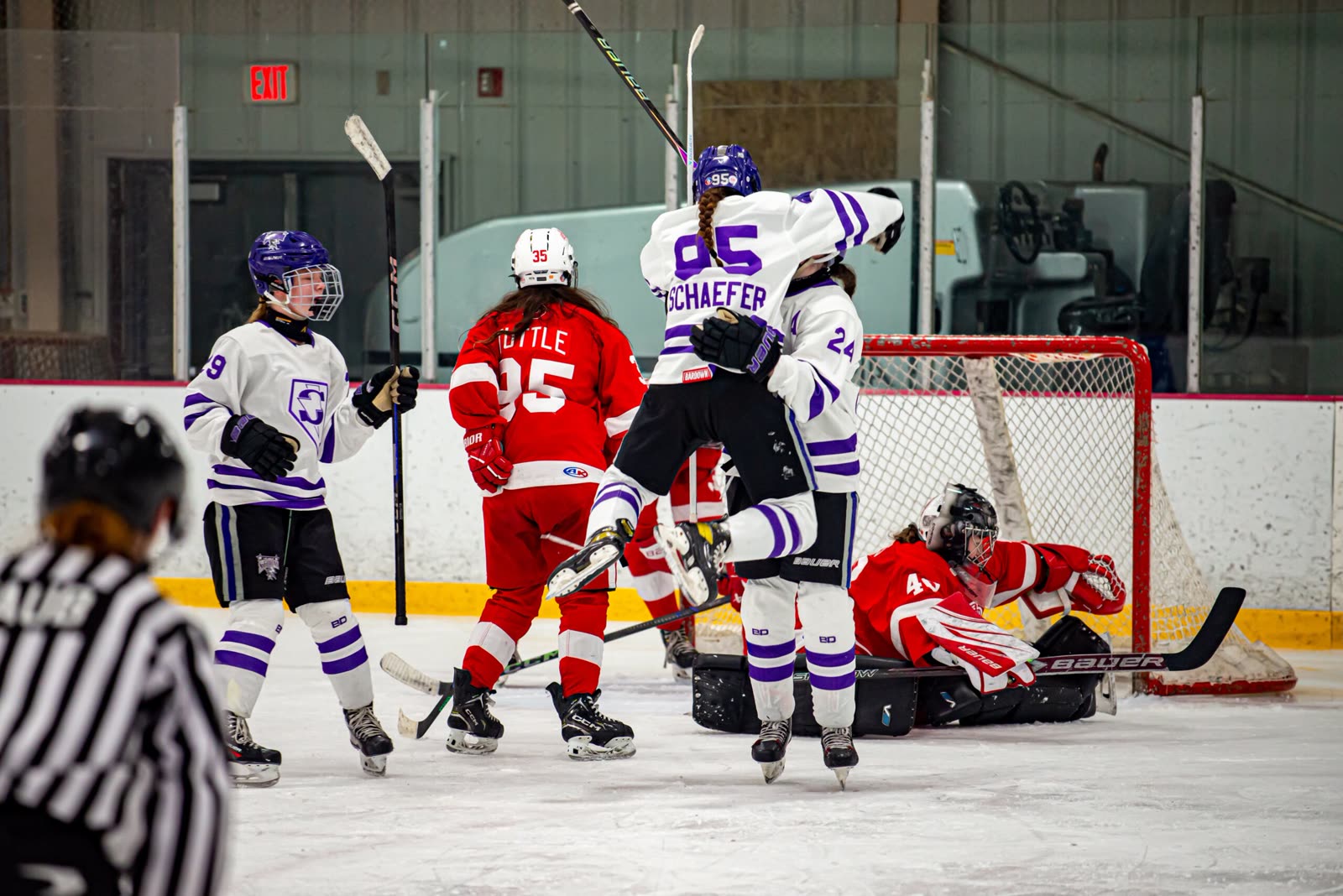 Game action in front of the net